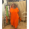 Vestido naranja tachuelas